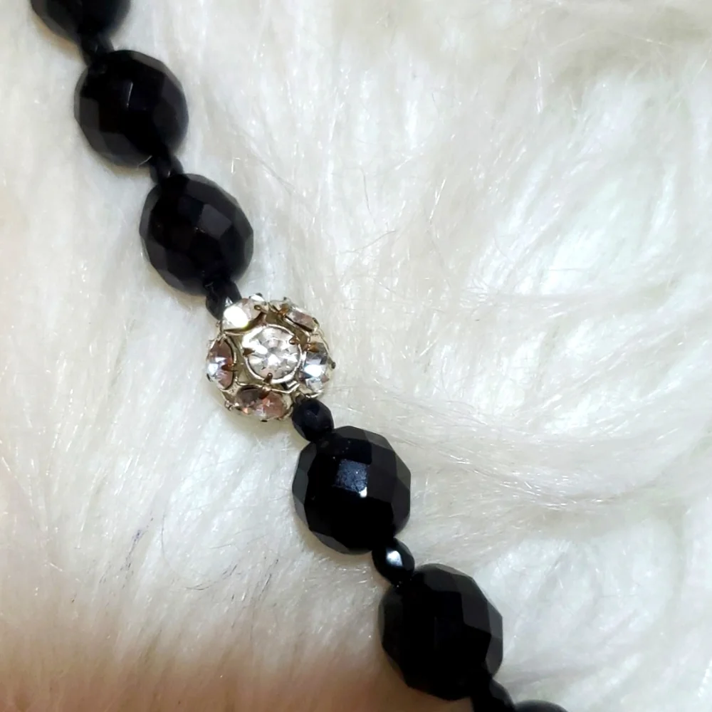 Boutique black, silver tone with a bling bow necklace